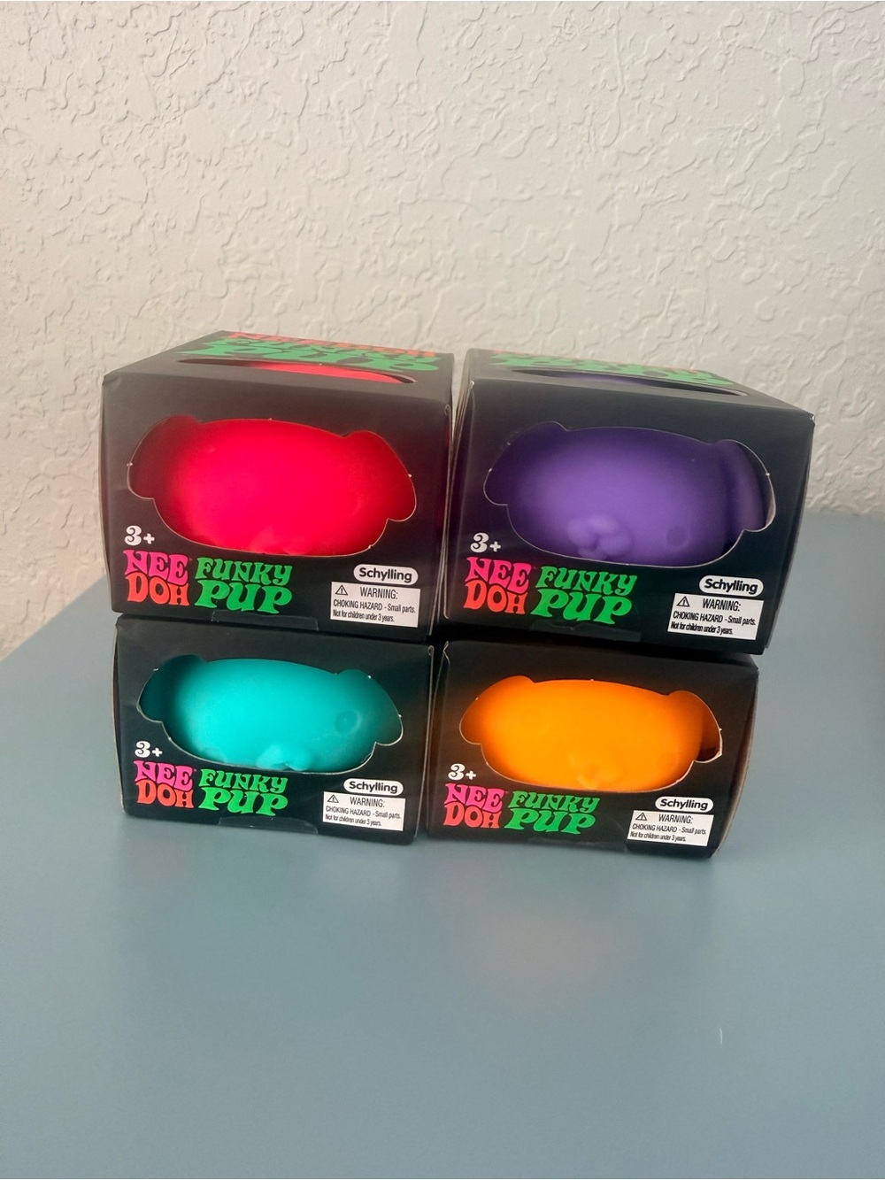 NeeDoh Funky Pup (4 bundle)- Purple, Teal, Orange, Pink